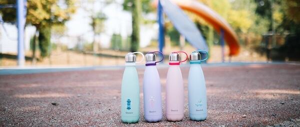Kids reusable water bottle in parc